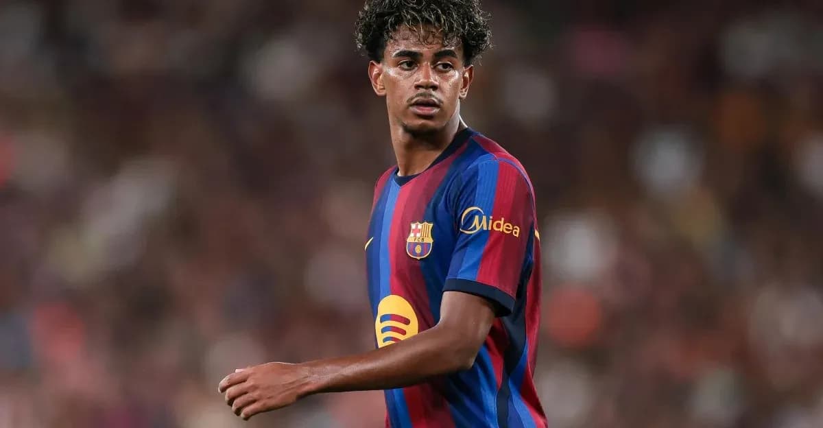 Player wearing Barcelona jersey on the pitch Player wearing Barcelona jersey on the pitch