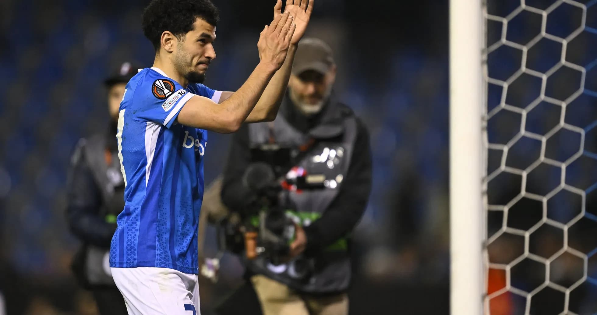 Player applauding fans after match conclusion Player applauding fans after match conclusion