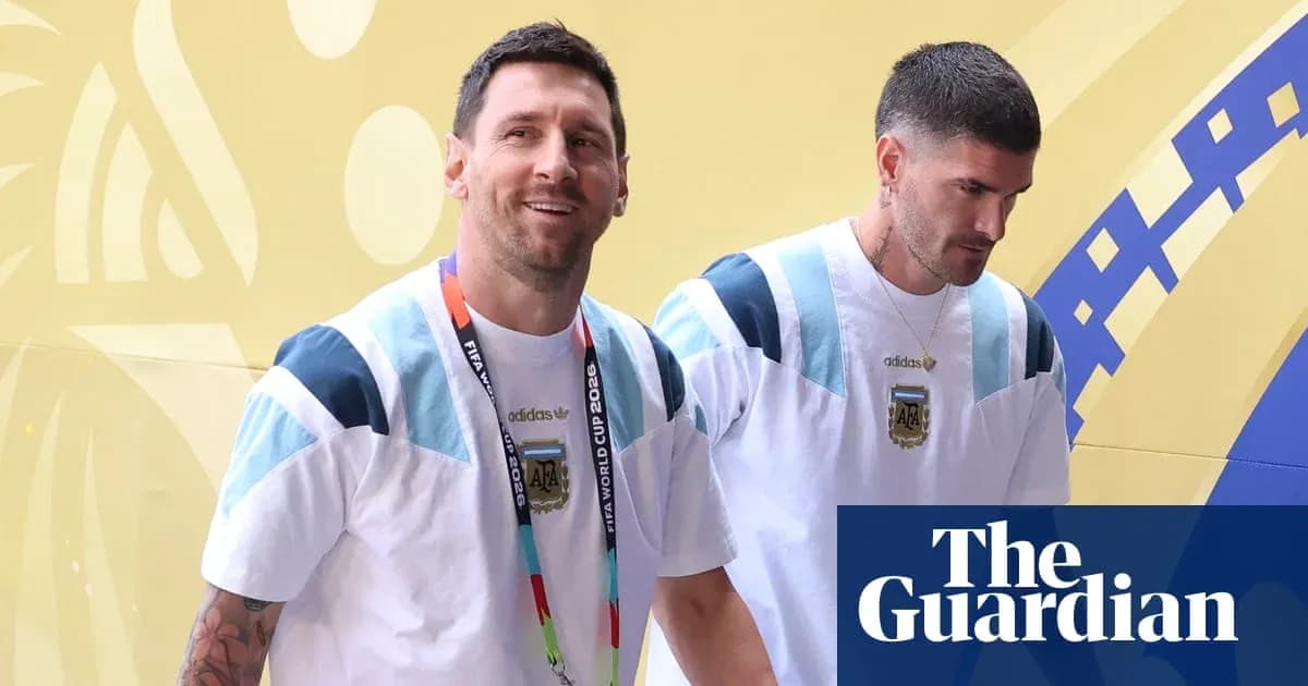 Two players walking in Argentina team attire Two players walking in Argentina team attire