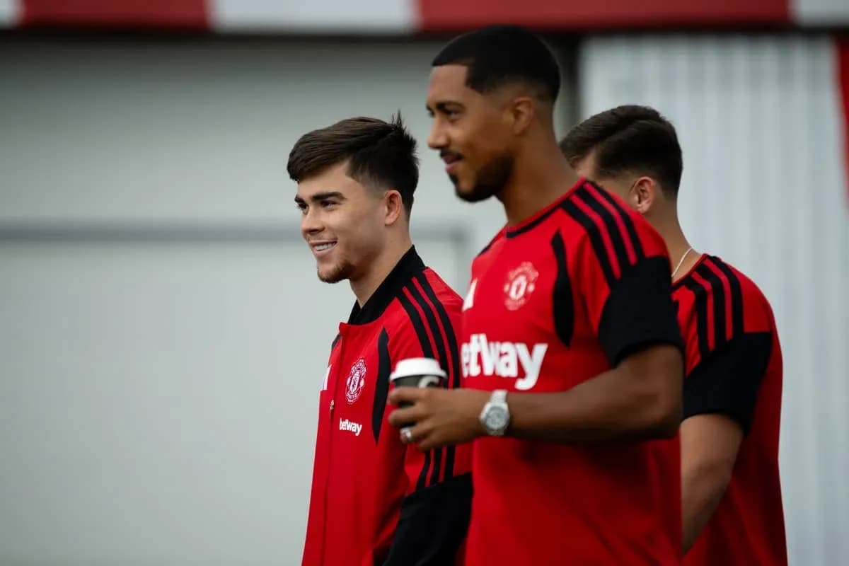 Manchester United players walking during training session Manchester United players walking during training session