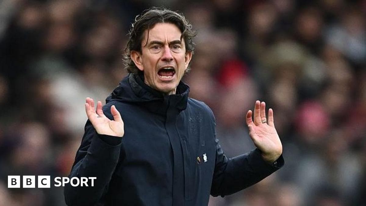 Manager gesturing during a football match Manager gesturing during a football match