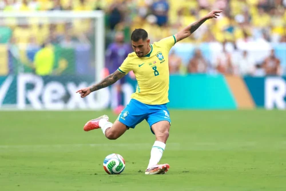Brazilian player taking a shot on goal during match Brazilian player taking a shot on goal during match