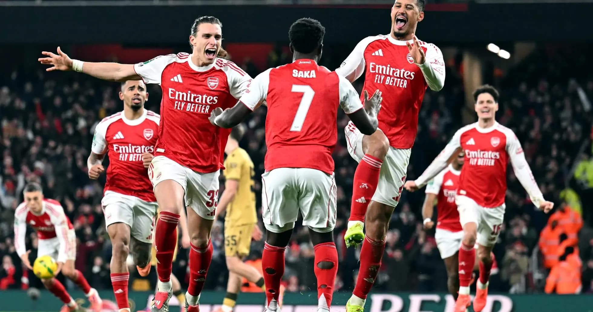 Arsenal players celebrating a goal against Crystal Palace Arsenal players celebrating a goal against Crystal Palace