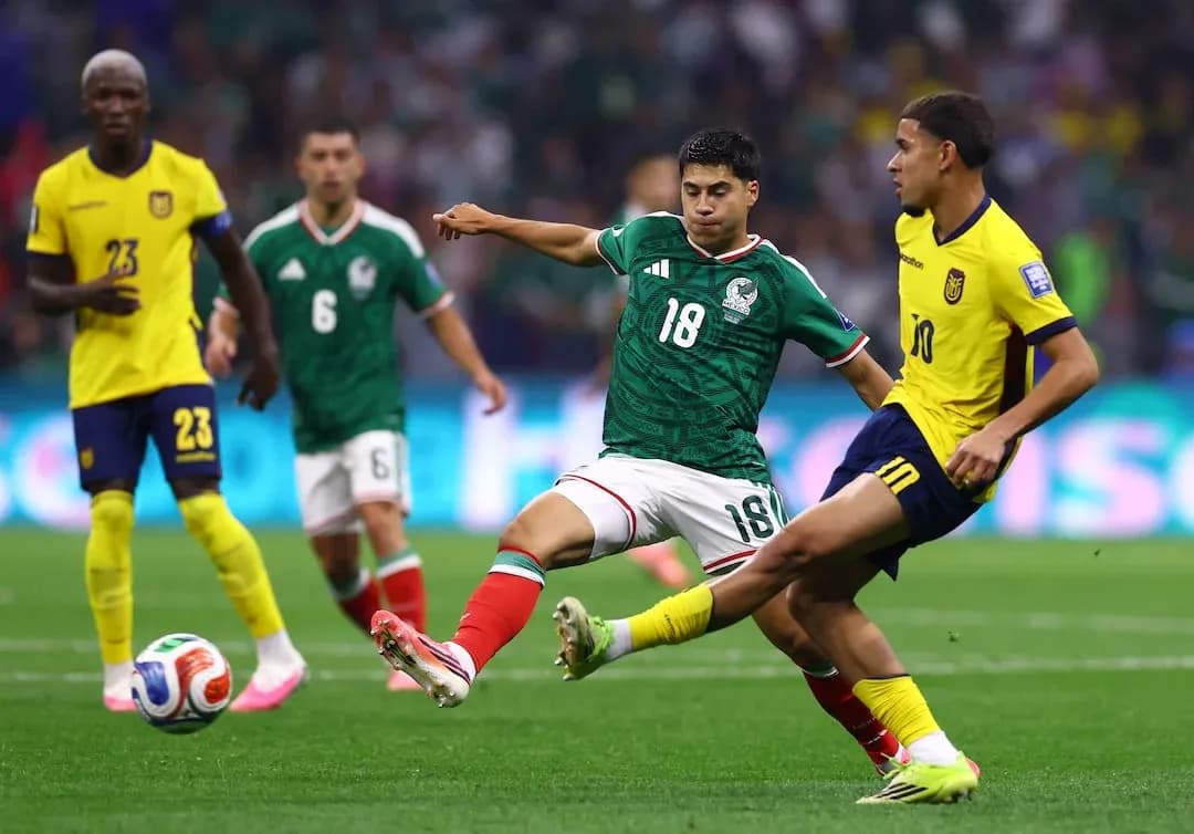 Player tackling during Mexico vs Ecuador match Player tackling during Mexico vs Ecuador match