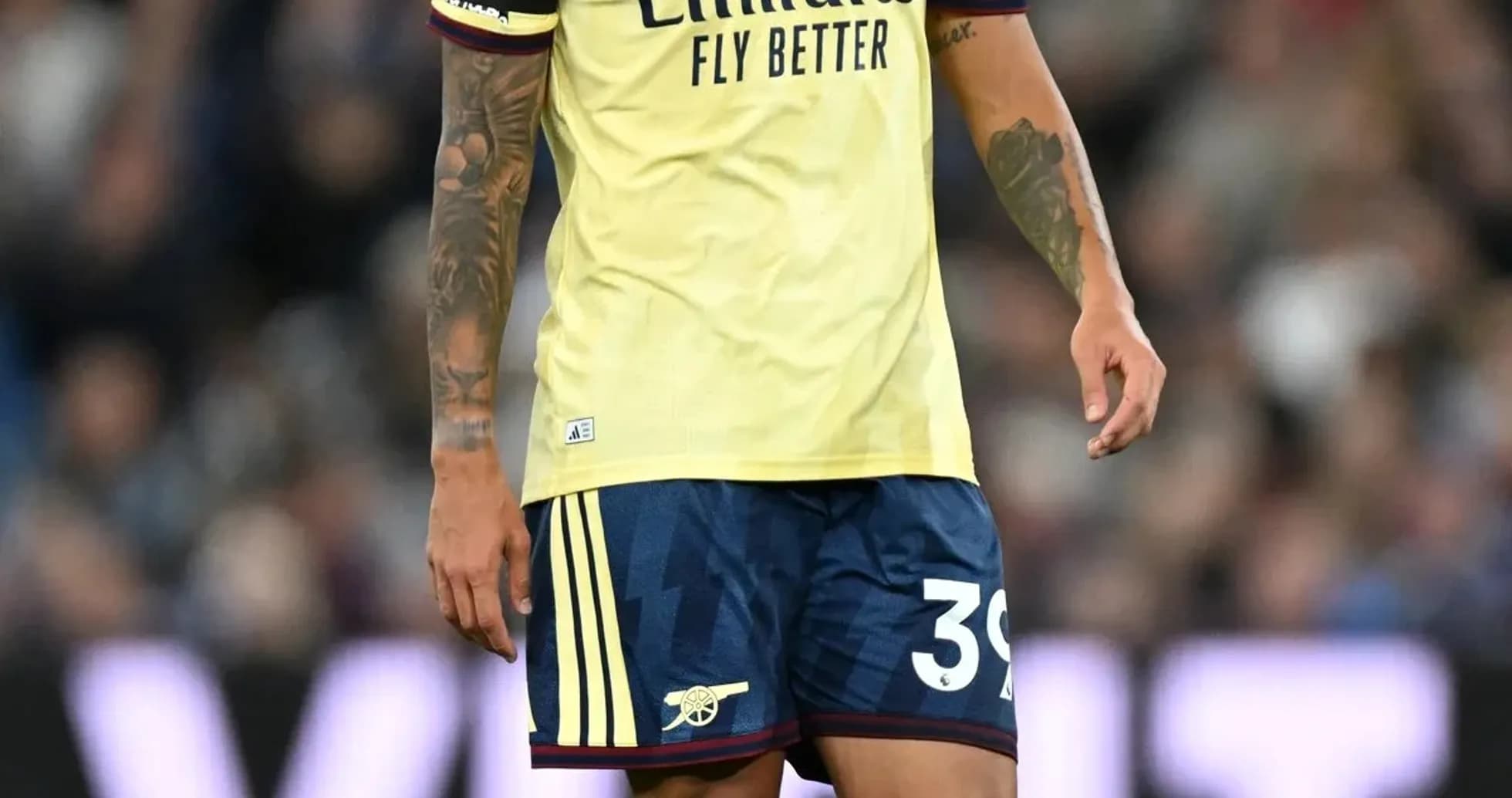 Player in Arsenal kit during match on field Player in Arsenal kit during match on field