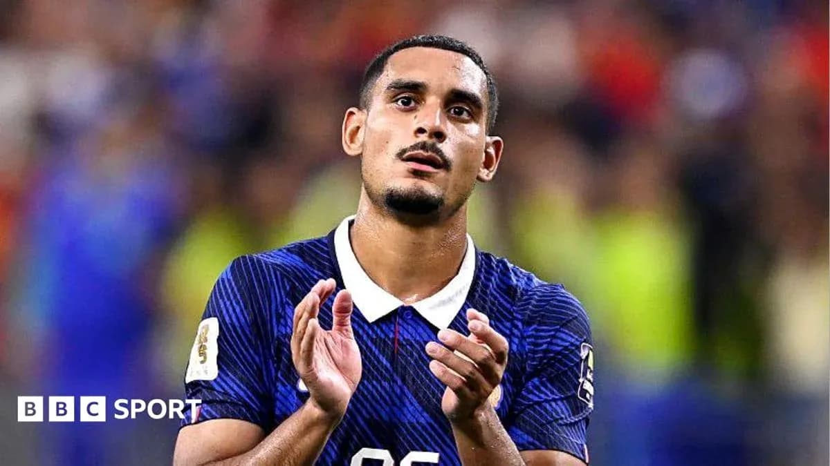 Player applauding after match wearing blue jersey Player applauding after match wearing blue jersey