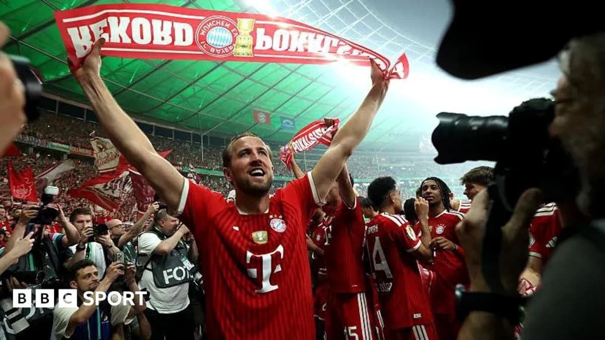 Player celebrating with fans after winning match Player celebrating with fans after winning match