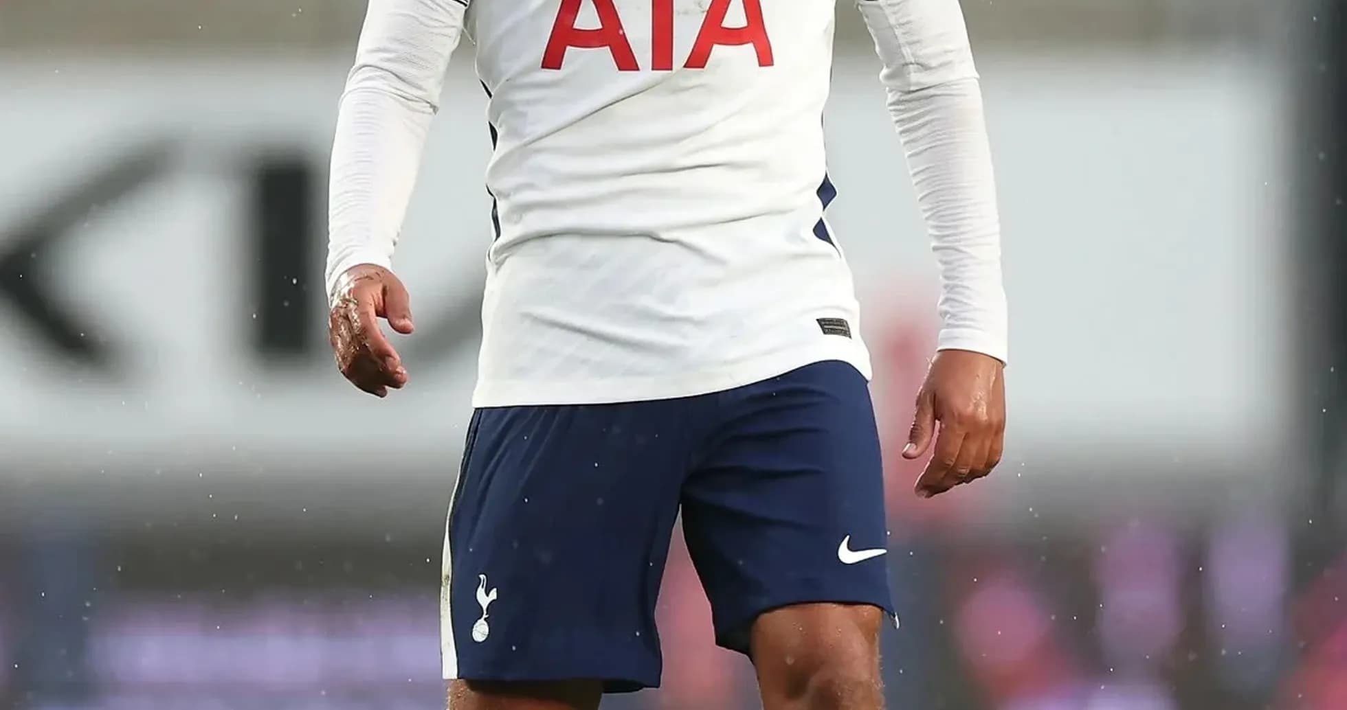 Player wearing Tottenham kit on the field Player wearing Tottenham kit on the field