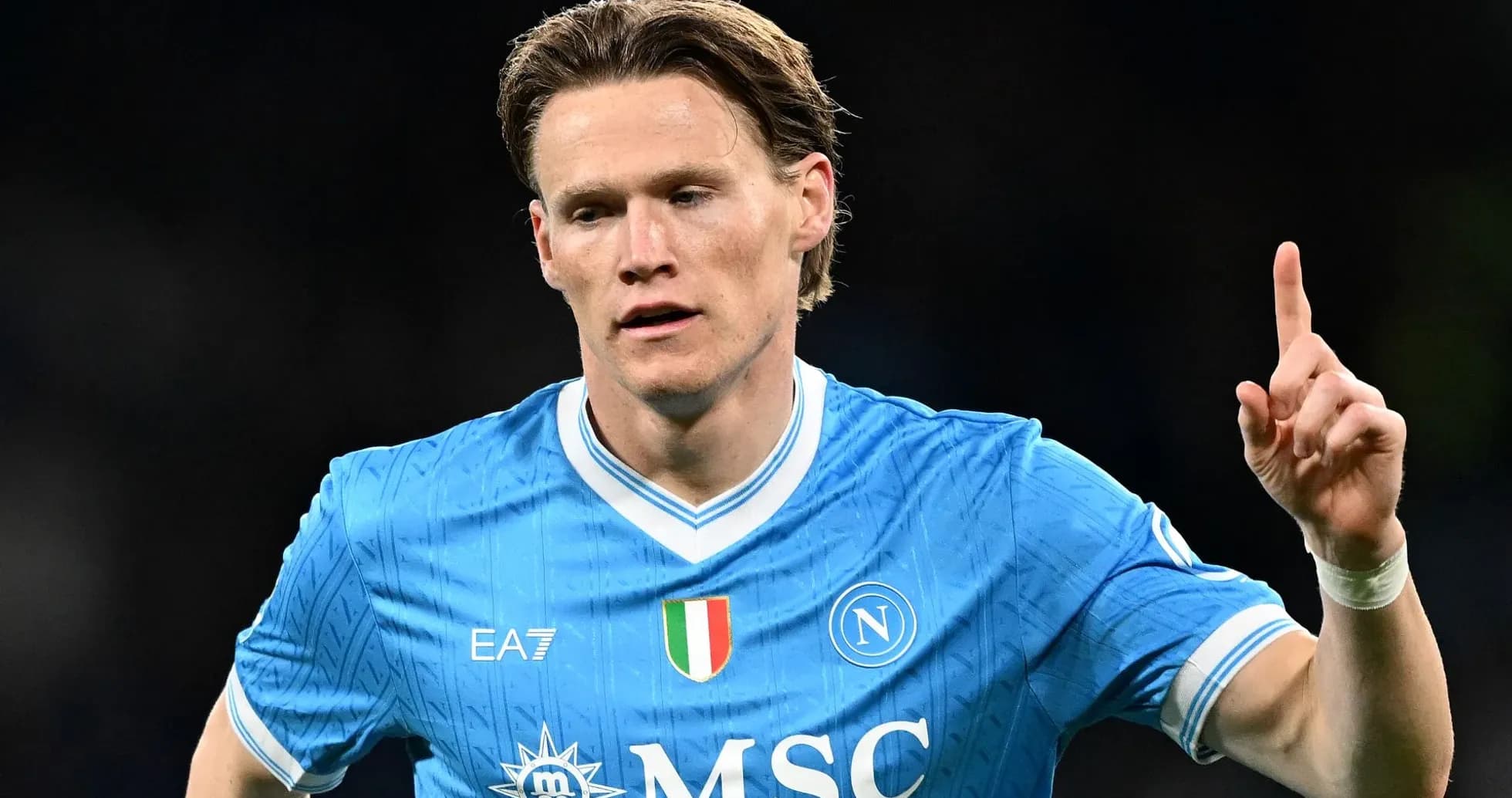 Player celebrating a goal in Napoli jersey Player celebrating a goal in Napoli jersey