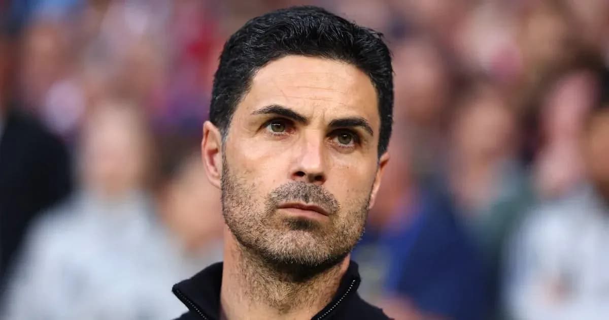 Manager focused during a match on the sidelines Manager focused during a match on the sidelines