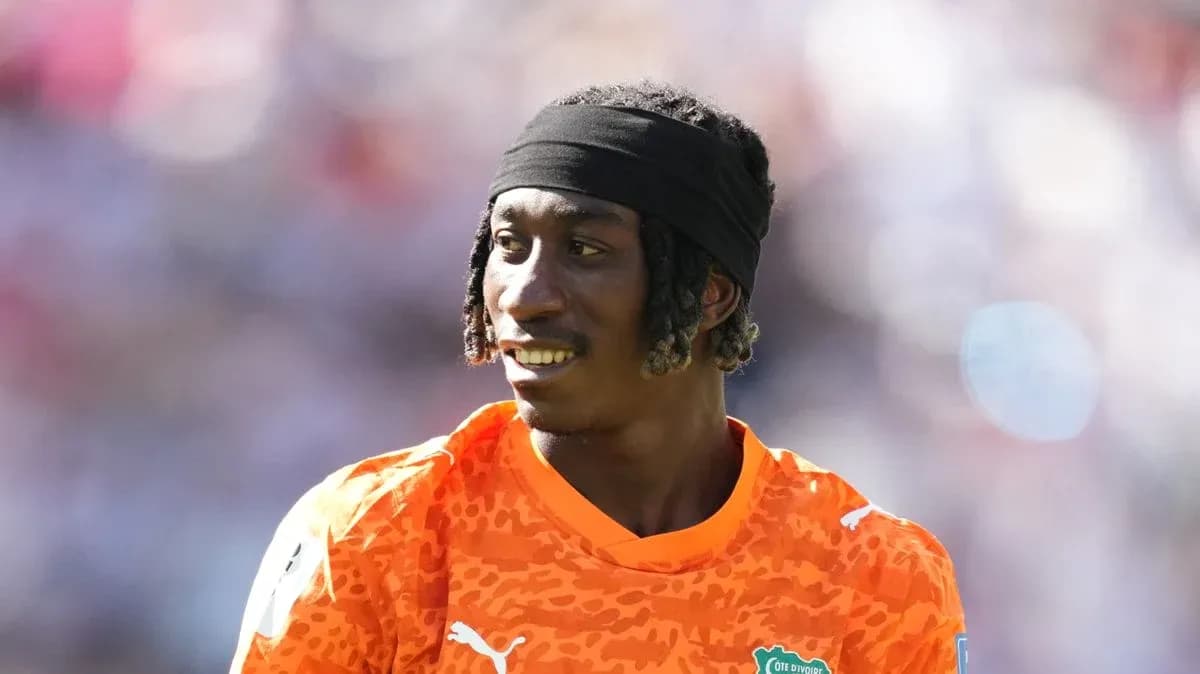 Goalkeeper wearing orange jersey during match Goalkeeper wearing orange jersey during match
