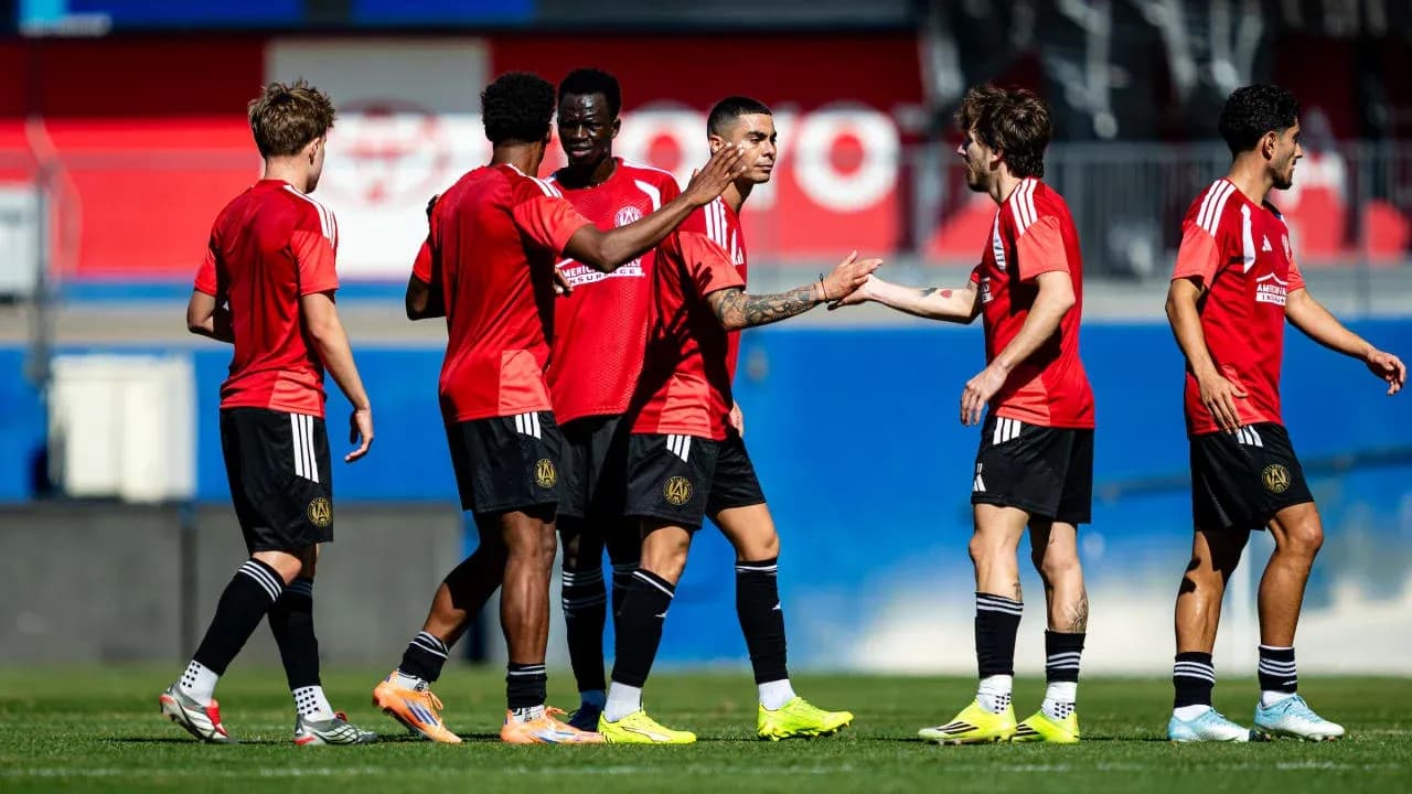 Atlanta United FC players celebrating during practice Atlanta United FC players celebrating during practice