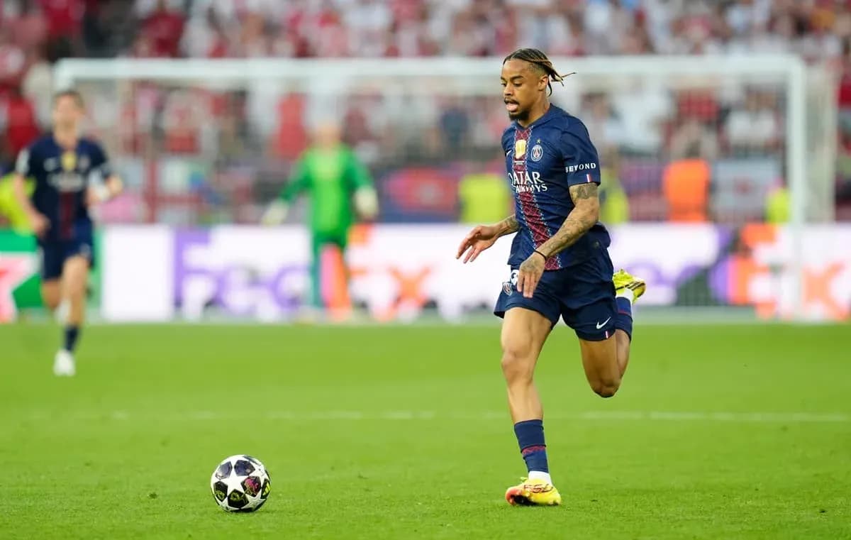 Player from PSG running with the ball during match Player from PSG running with the ball during match
