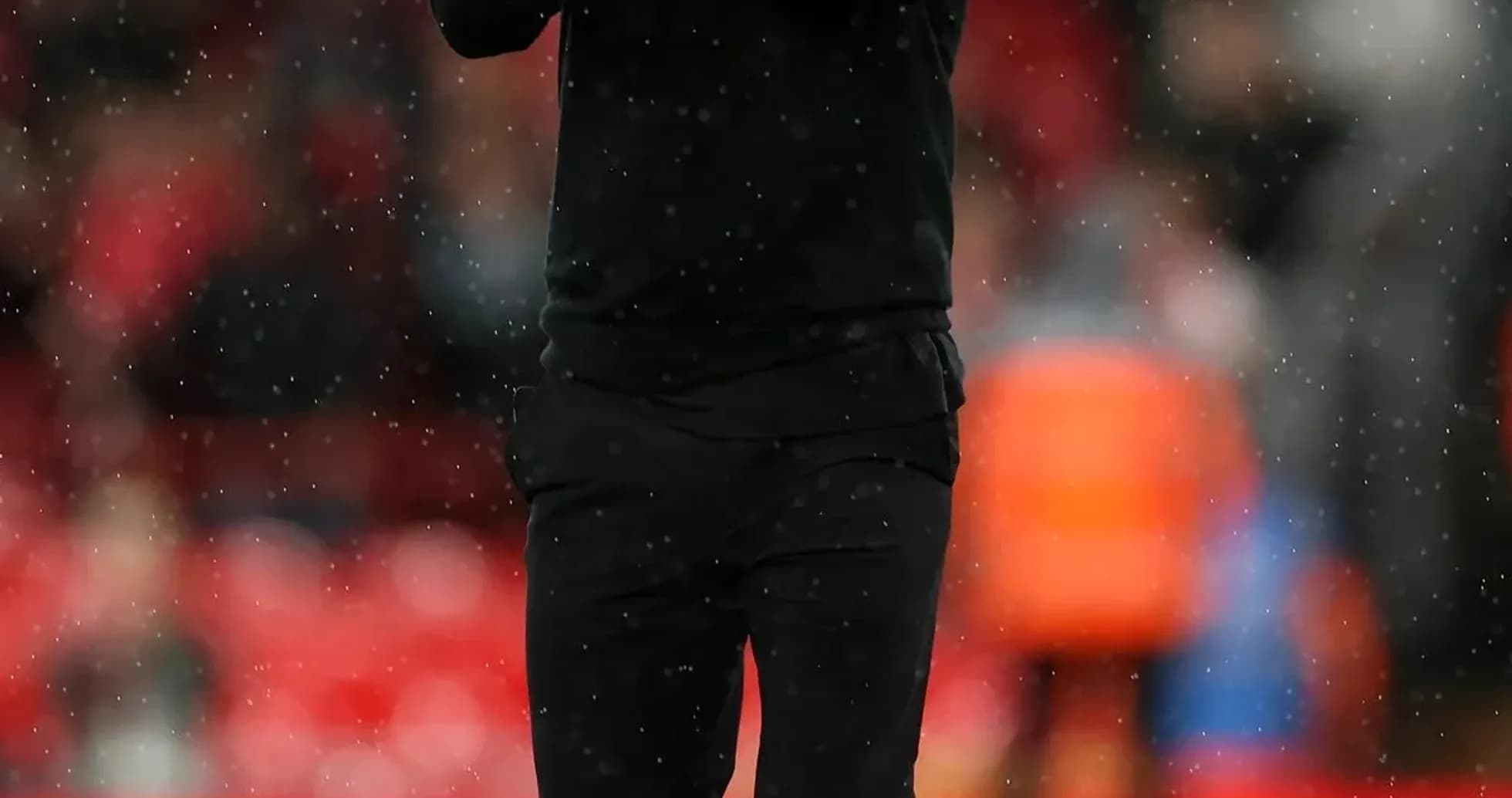 Coach applauding on the sidelines during match Coach applauding on the sidelines during match