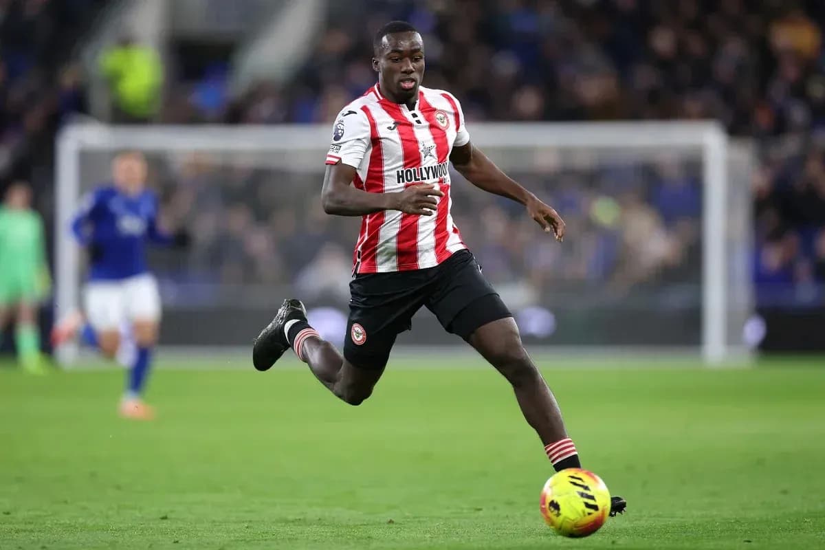 Brentford player sprinting during a football match Brentford player sprinting during a football match