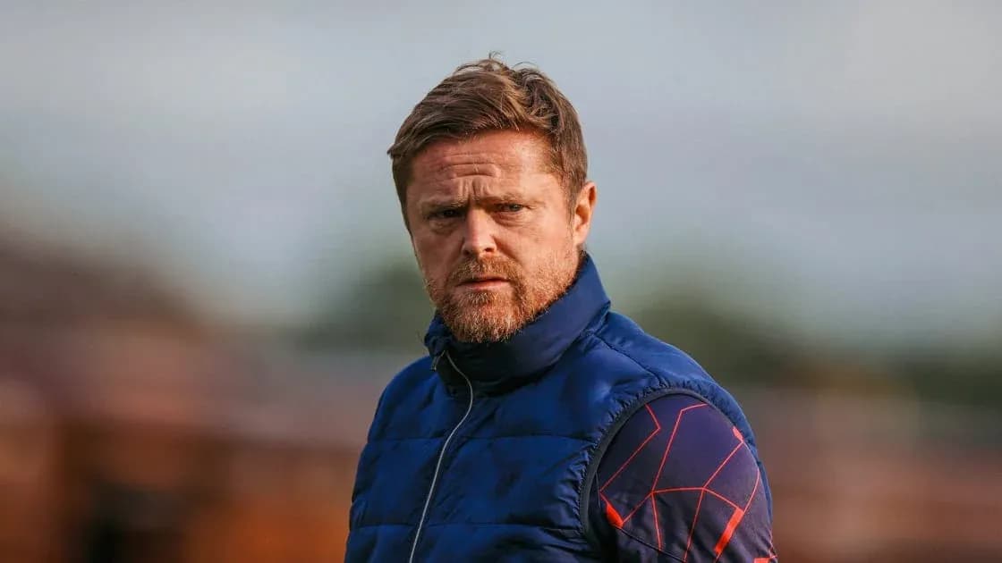 Coach observing during training session at field Coach observing during training session at field