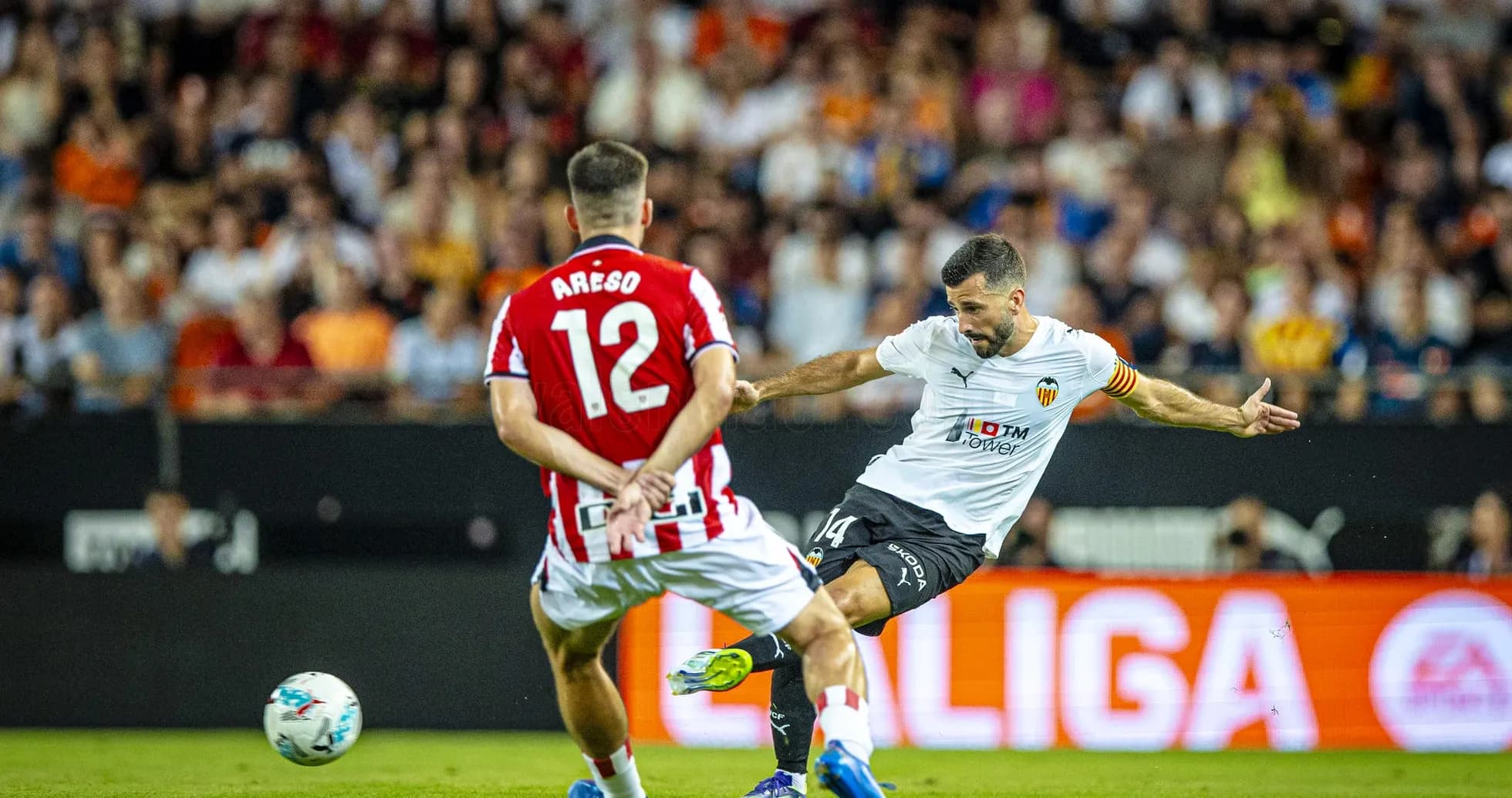 Valencia player shoots during La Liga match Valencia player shoots during La Liga match