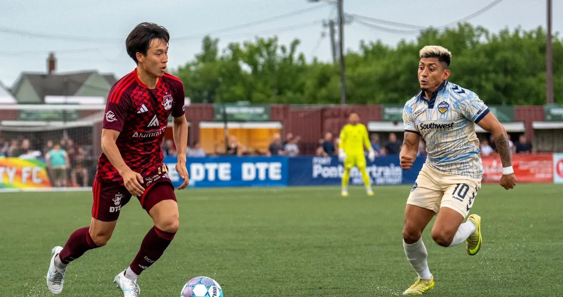 Players competing for the ball during USL match Players competing for the ball during USL match
