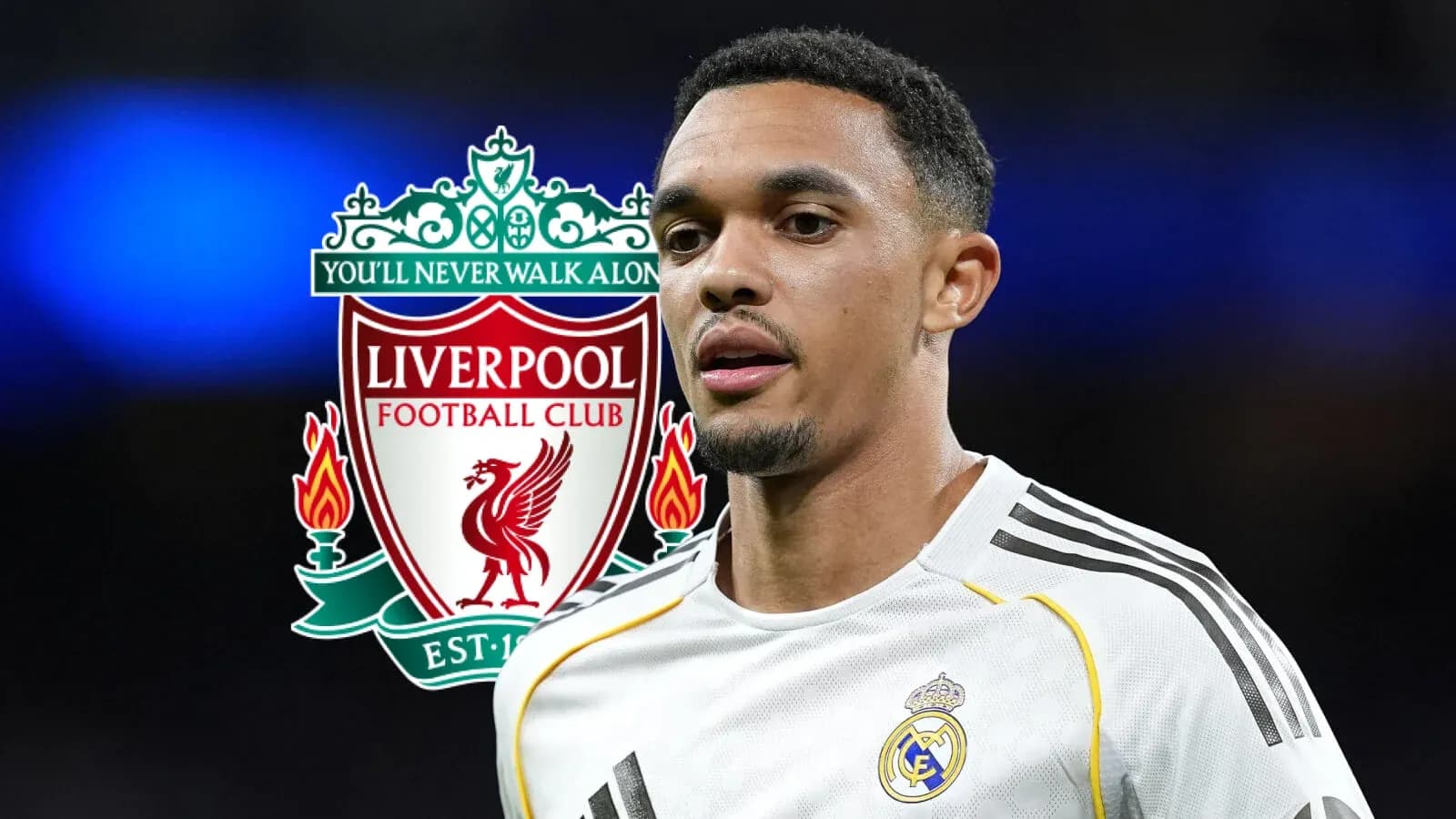Player in football kit with club logos behind Player in football kit with club logos behind