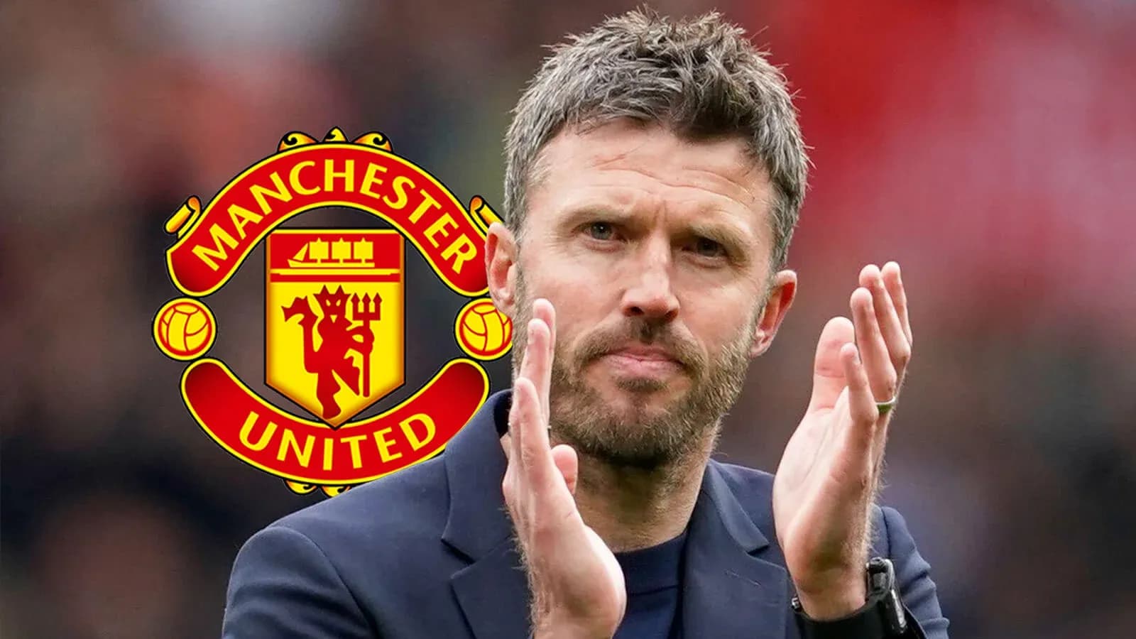 Coach applauding with Manchester United logo in background Coach applauding with Manchester United logo in background
