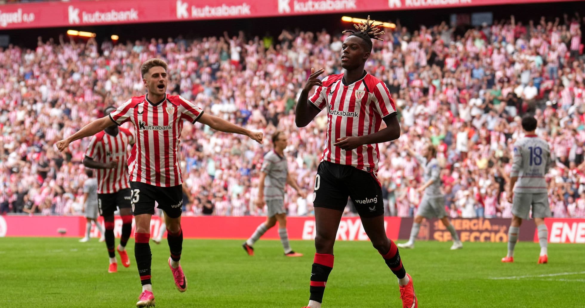 Athletic Bilbao players celebrating a goal in stadium Athletic Bilbao players celebrating a goal in stadium