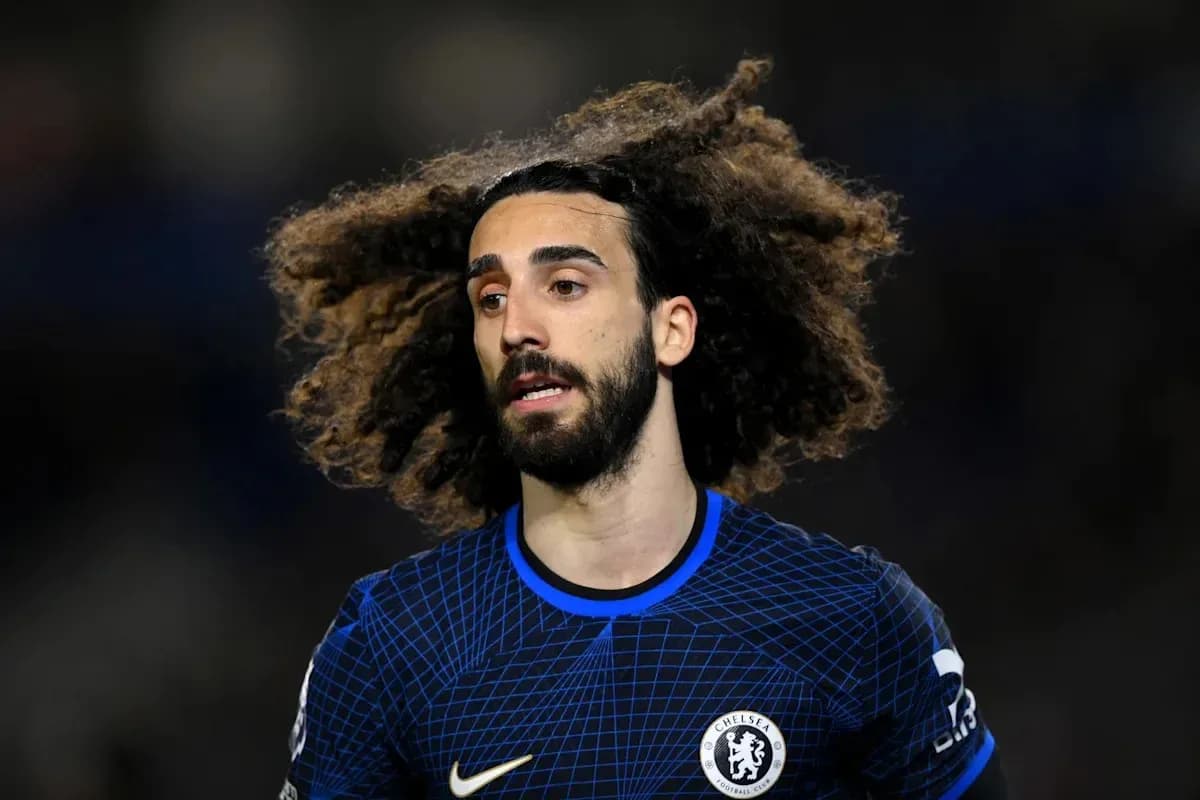 Player with curly hair wearing Chelsea jersey Player with curly hair wearing Chelsea jersey