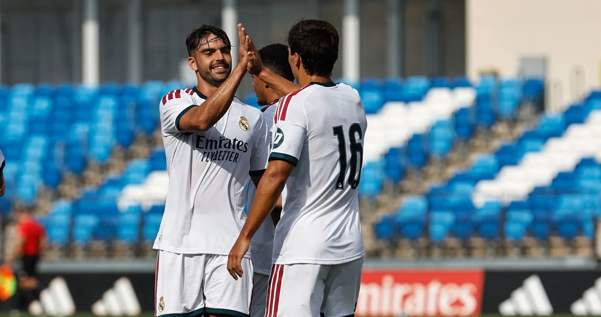 Real Madrid players celebrating a goal together Real Madrid players celebrating a goal together