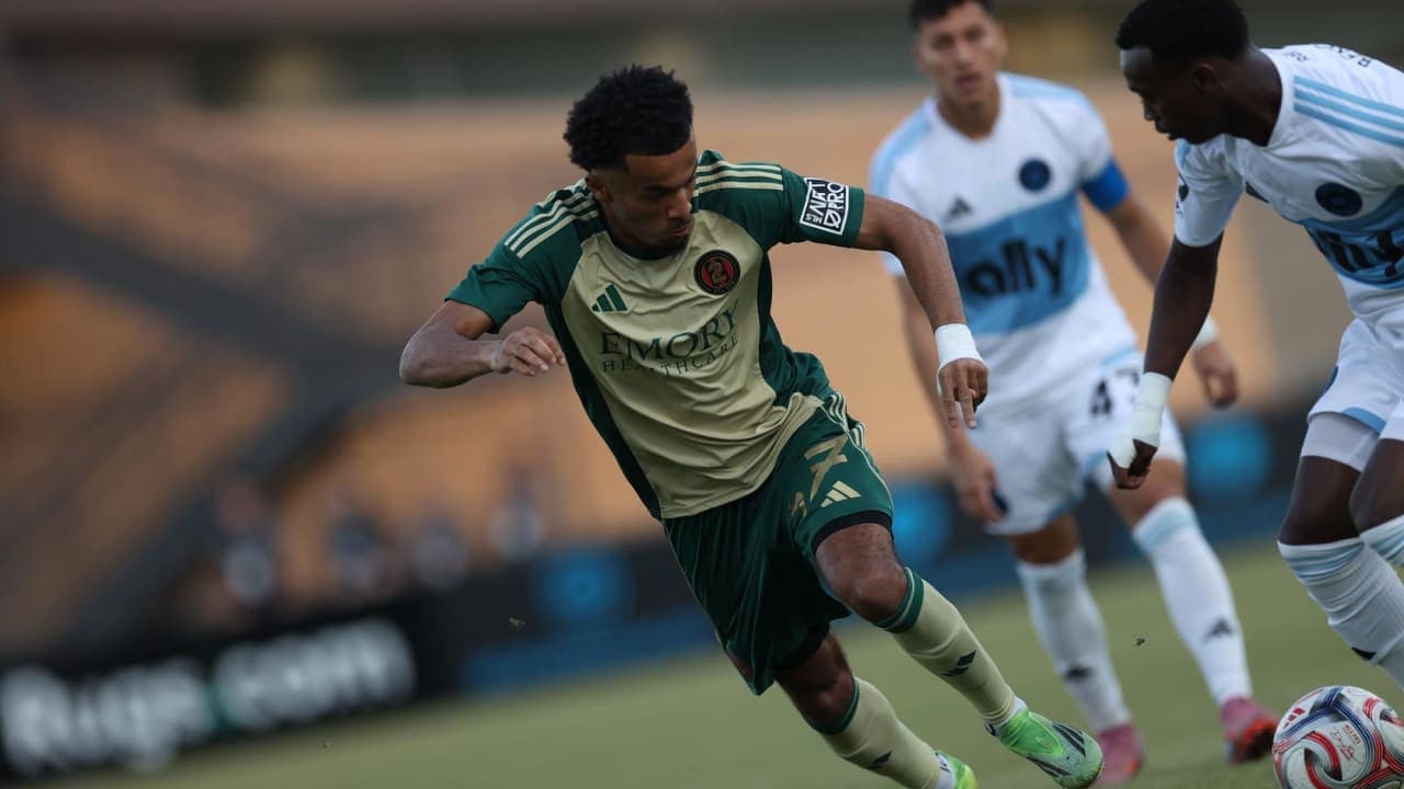 Atlanta United II player dribbling against opponent Atlanta United II player dribbling against opponent