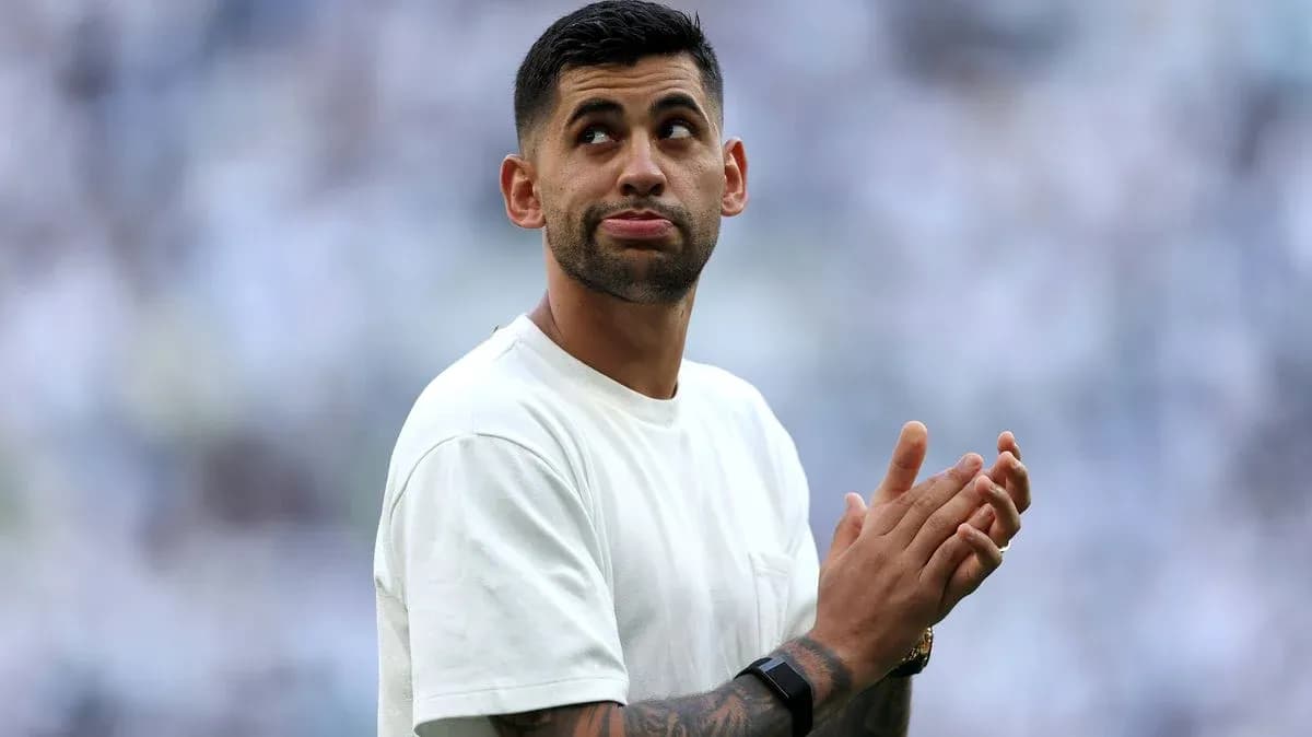 Player clapping during pre-match warm-up on field Player clapping during pre-match warm-up on field