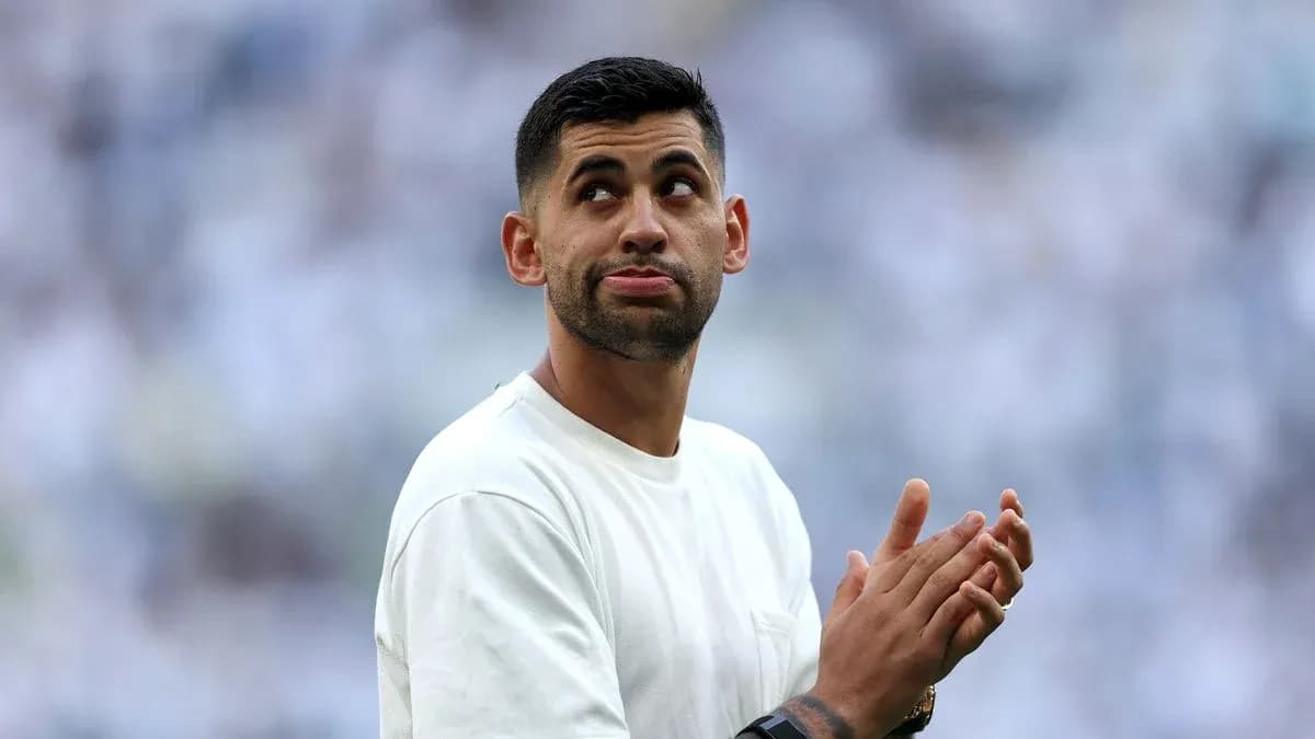 Player clapping during match warm-up on field Player clapping during match warm-up on field