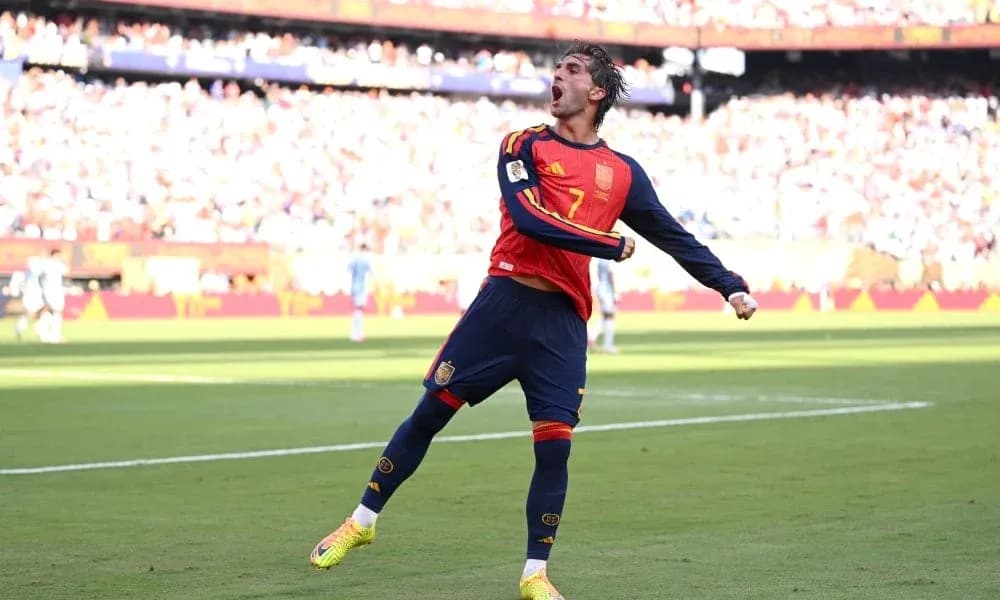 Player celebrating a goal during a match Player celebrating a goal during a match