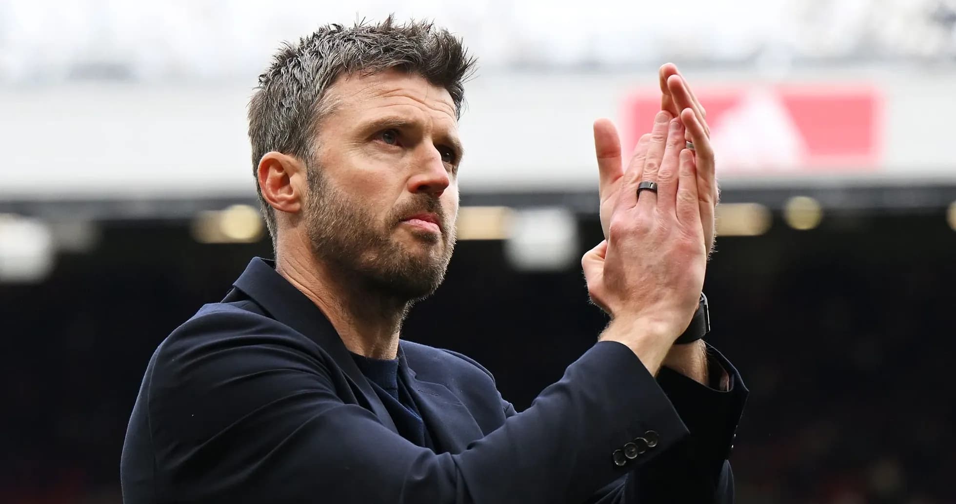 Man applauding during a football match Man applauding during a football match