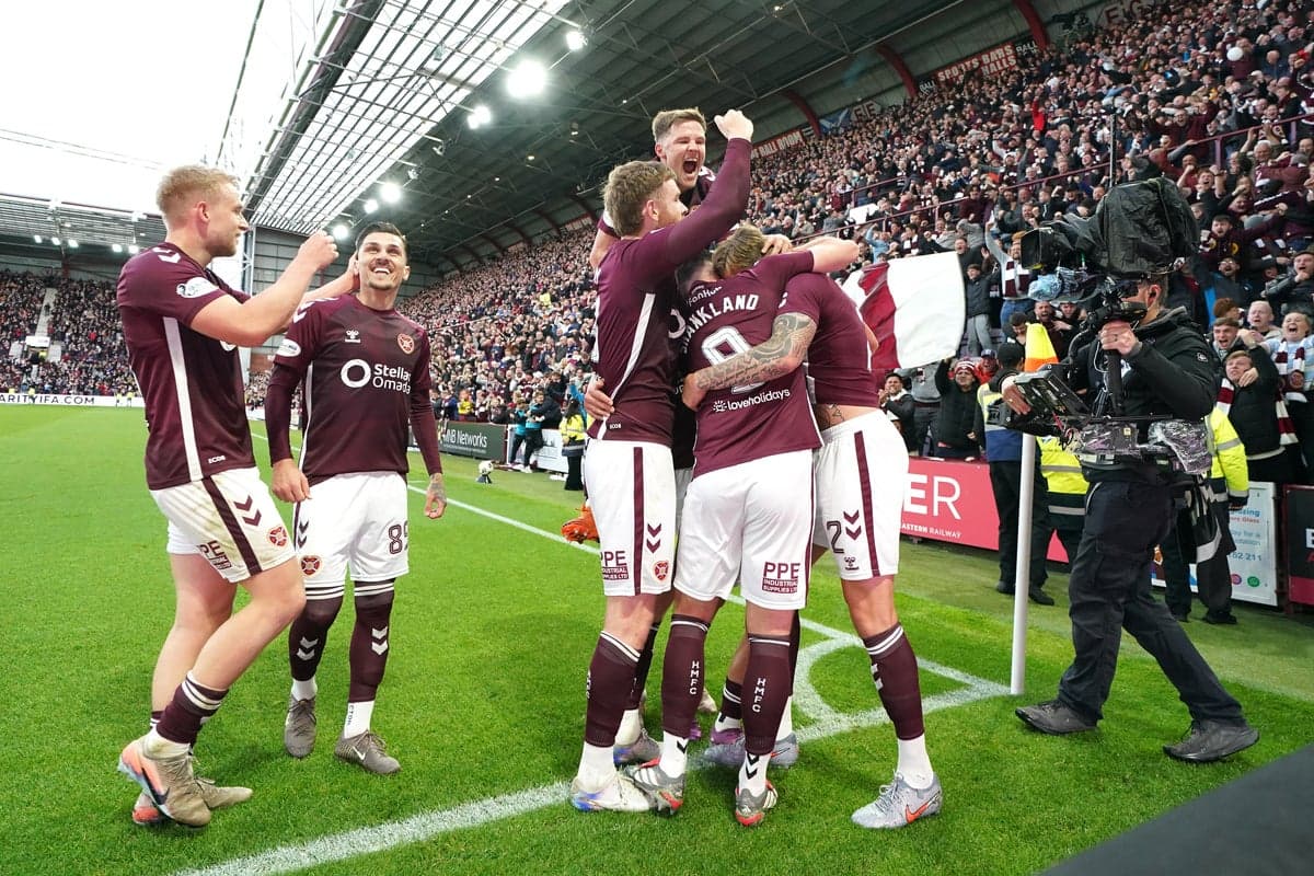 Hearts players celebrating a goal at Tynecastle Stadium Hearts players celebrating a goal at Tynecastle Stadium