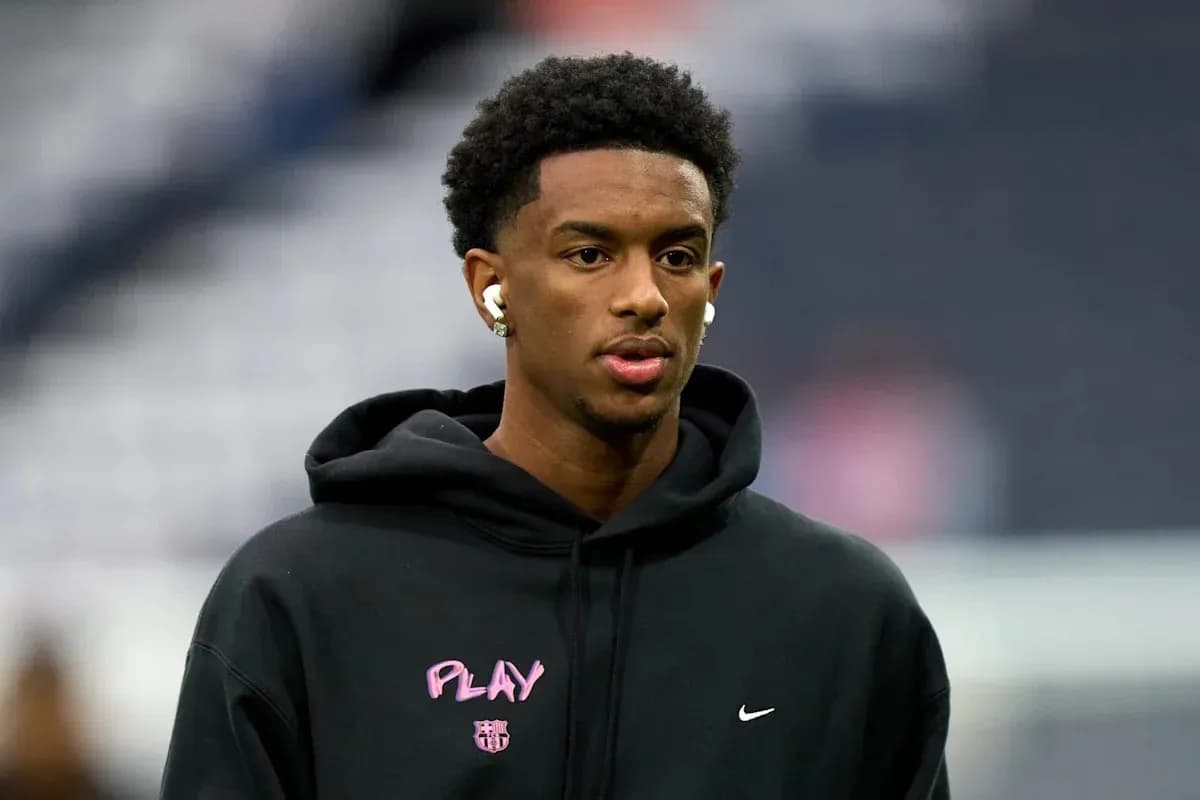Player wearing headphones during pre-game warm-up Player wearing headphones during pre-game warm-up