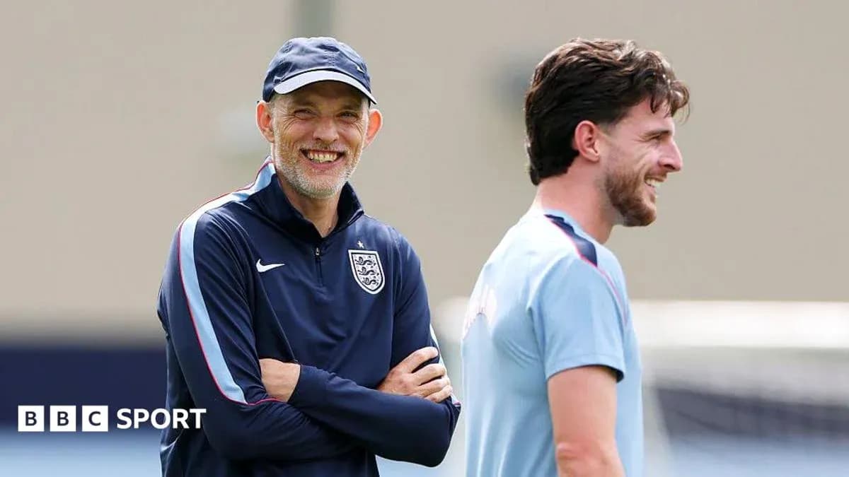 Coach and player smiling during training session Coach and player smiling during training session