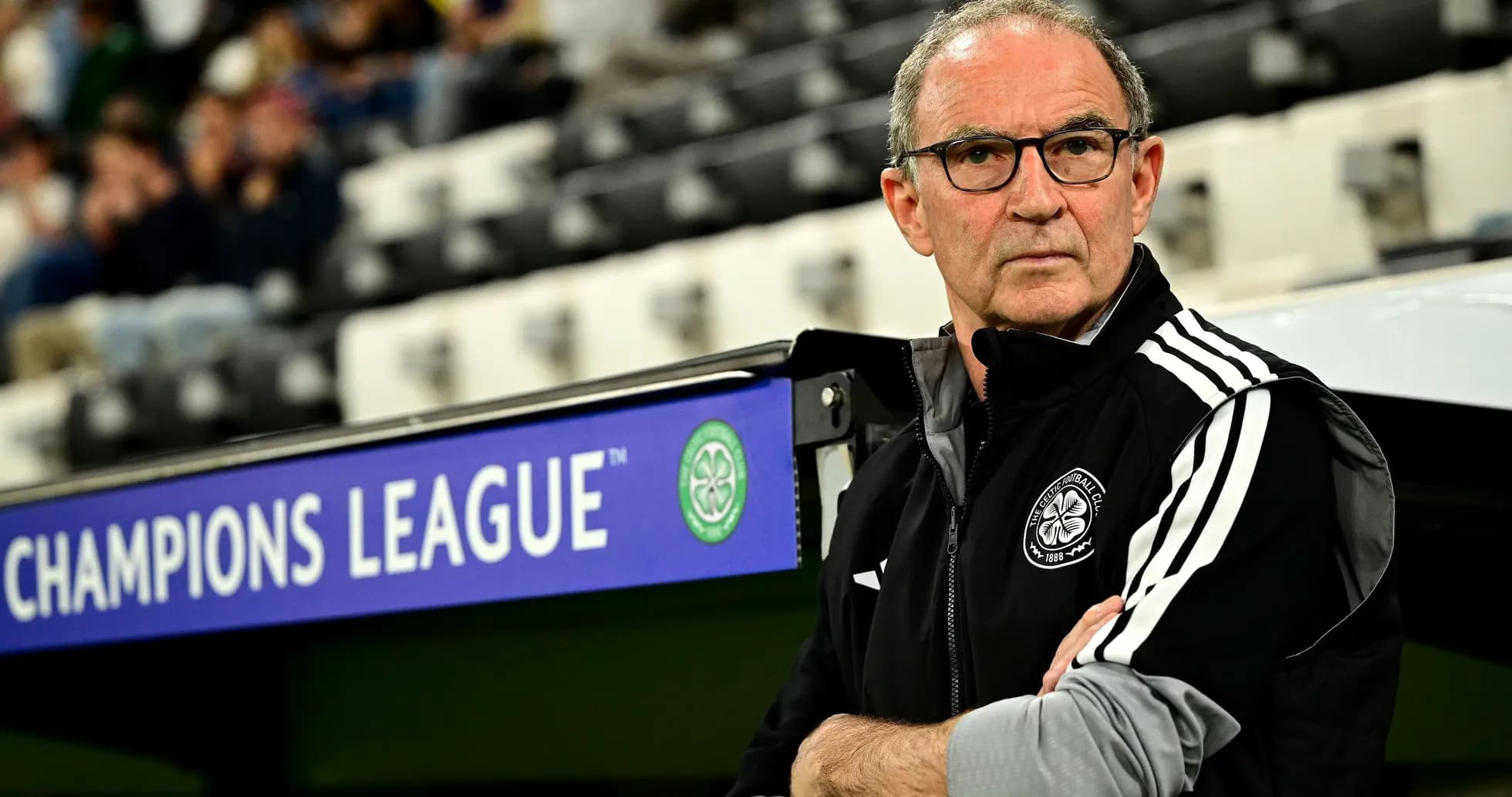 Coach observing match from technical area during Champions League Coach observing match from technical area during Champions League