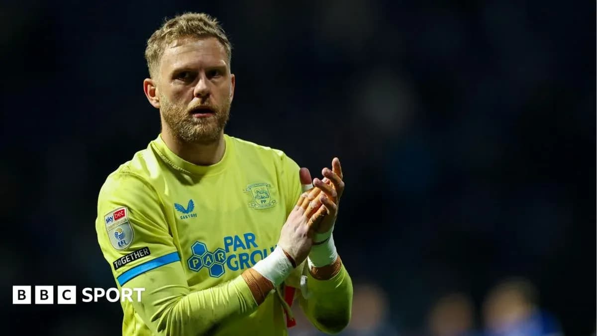Goalkeeper clapping after match in yellow kit Goalkeeper clapping after match in yellow kit