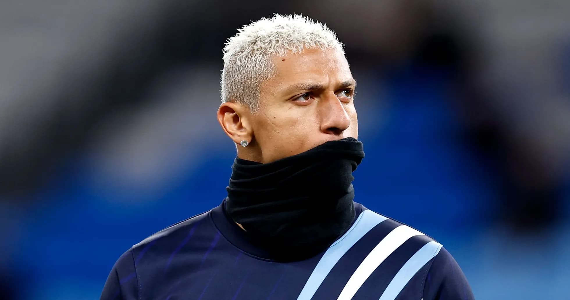 Player wearing a black scarf during warm-up Player wearing a black scarf during warm-up