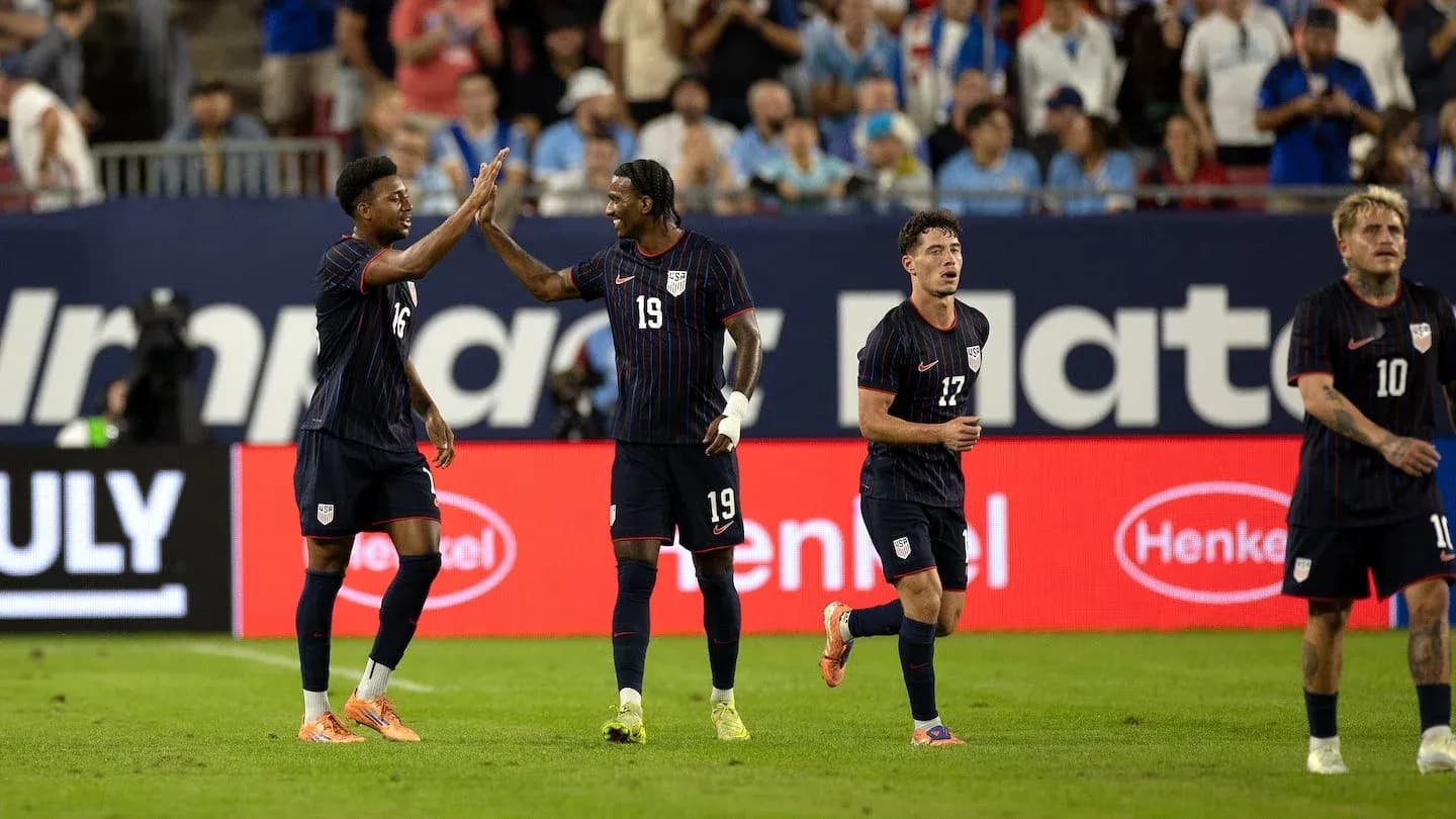 USA players celebrating during World Cup match USA players celebrating during World Cup match