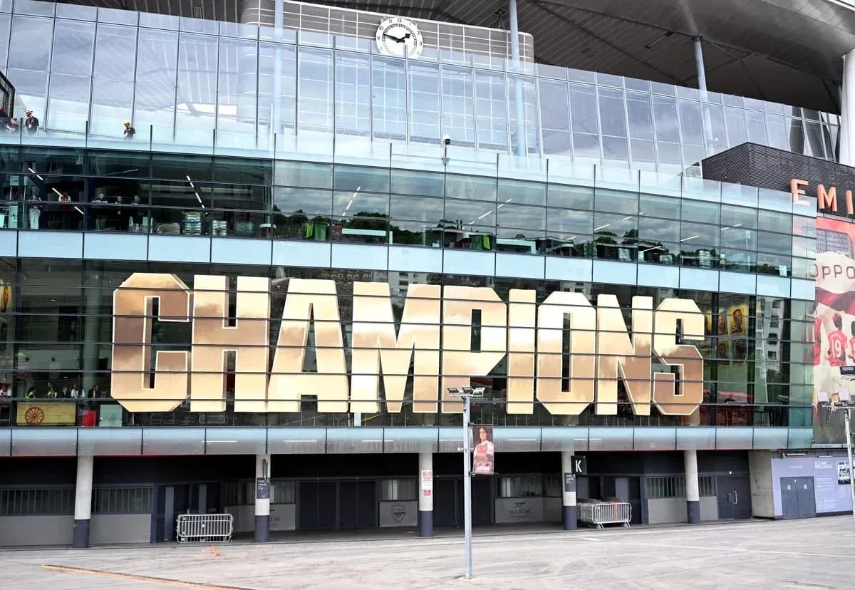 Emirates Stadium displaying 'CHAMPIONS' sign Emirates Stadium displaying 'CHAMPIONS' sign
