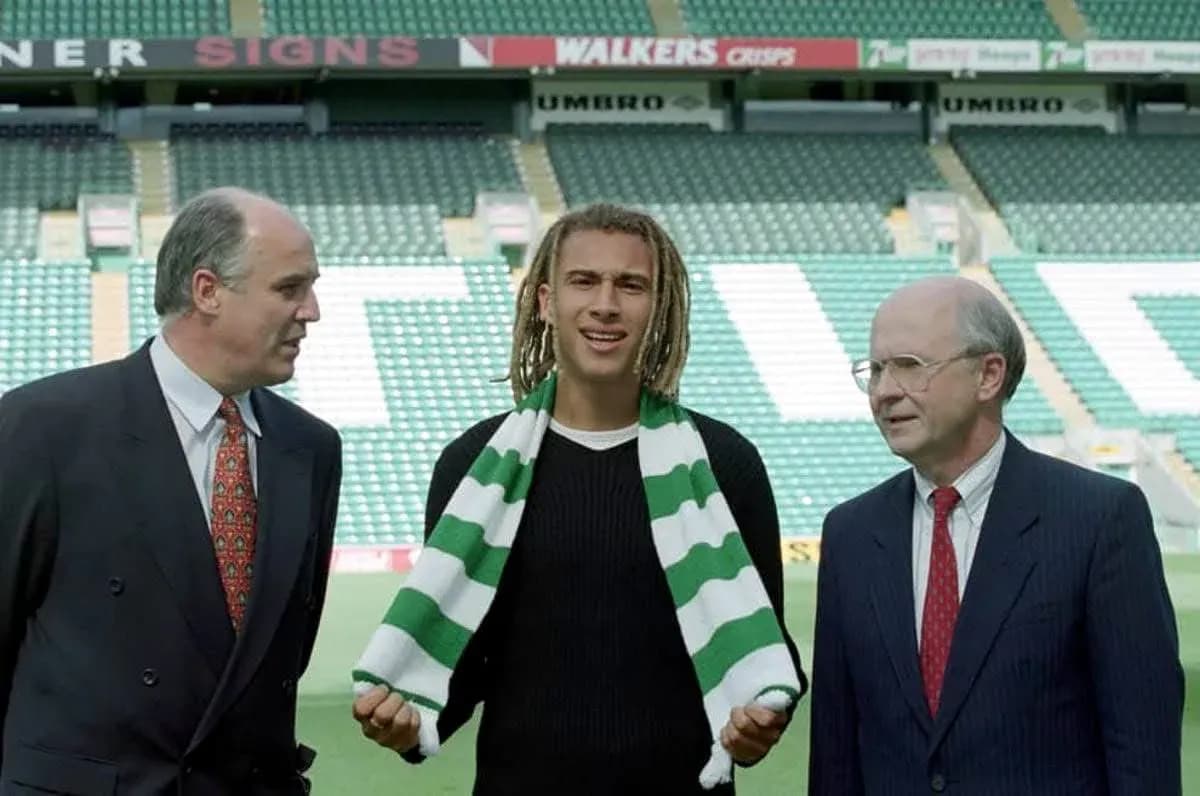 New player being introduced at press conference with executives New player being introduced at press conference with executives