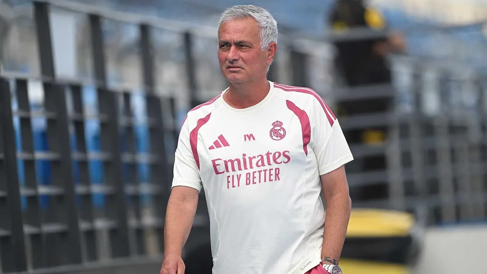 Coach walking on the training pitch at Madrid Coach walking on the training pitch at Madrid