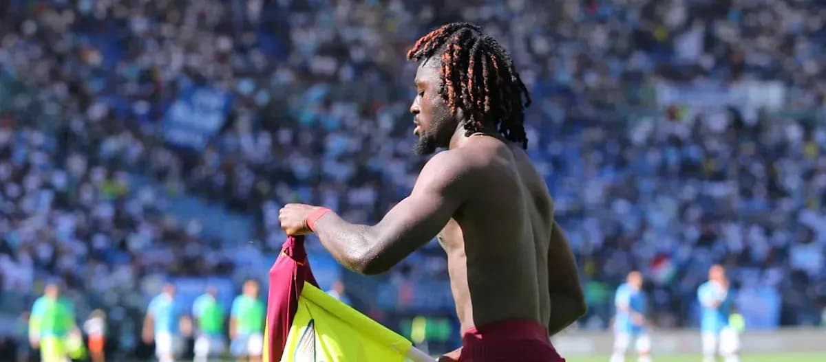 Player removing jersey during match celebration Player removing jersey during match celebration