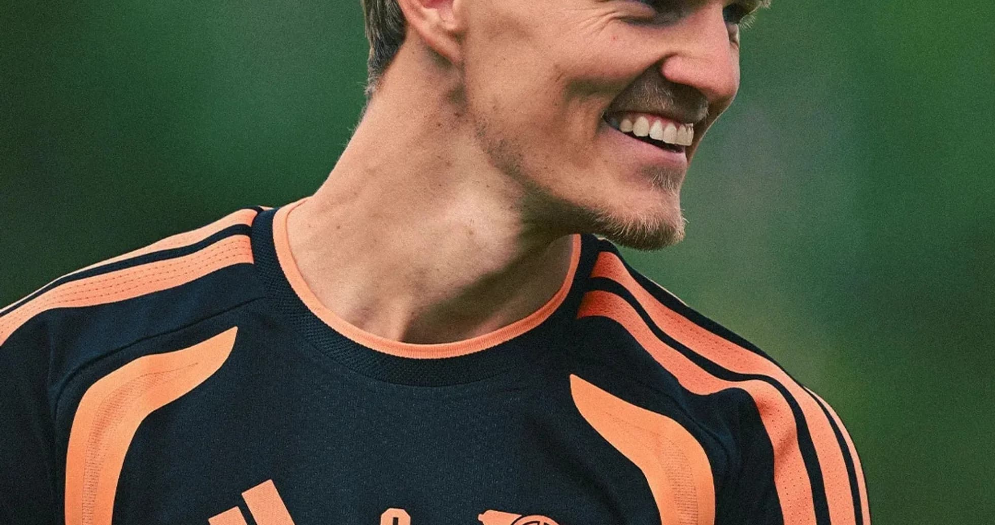 Player in training kit smiling at camera Player in training kit smiling at camera