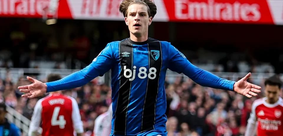 Bournemouth player celebrating a goal on the pitch Bournemouth player celebrating a goal on the pitch
