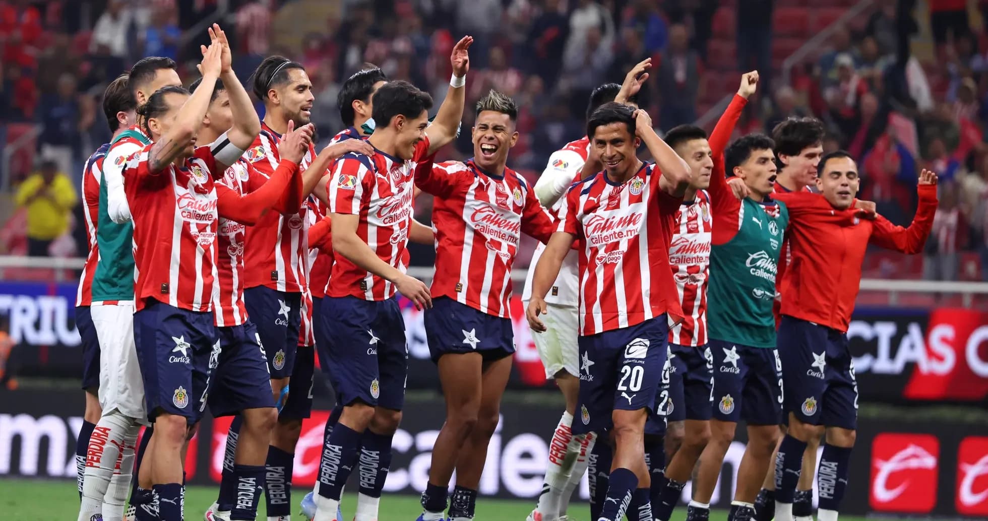 Chivas celebrating victory in Liga MX match Chivas celebrating victory in Liga MX match