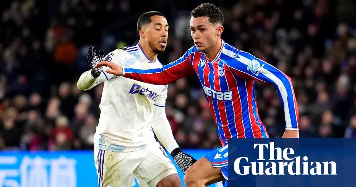 Crystal Palace player evading defender during match Crystal Palace player evading defender during match