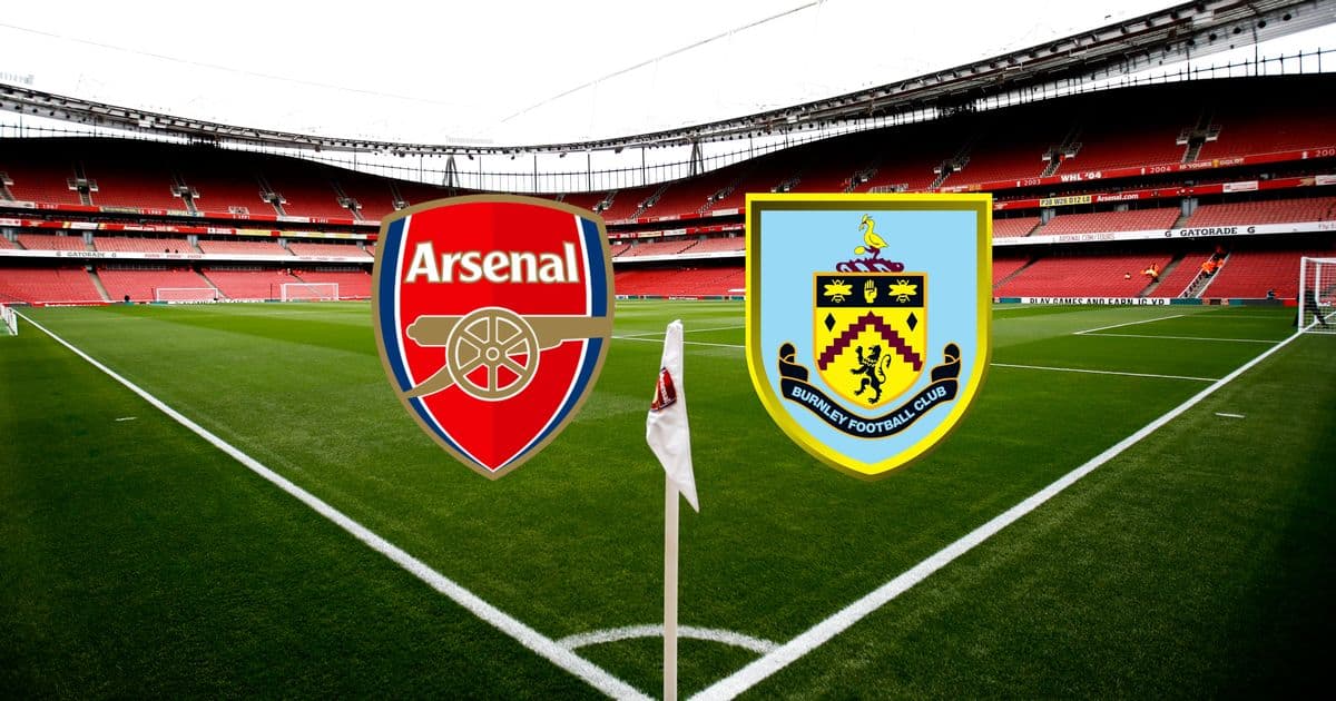 Arsenal and Burnley logos at stadium pitch Arsenal and Burnley logos at stadium pitch
