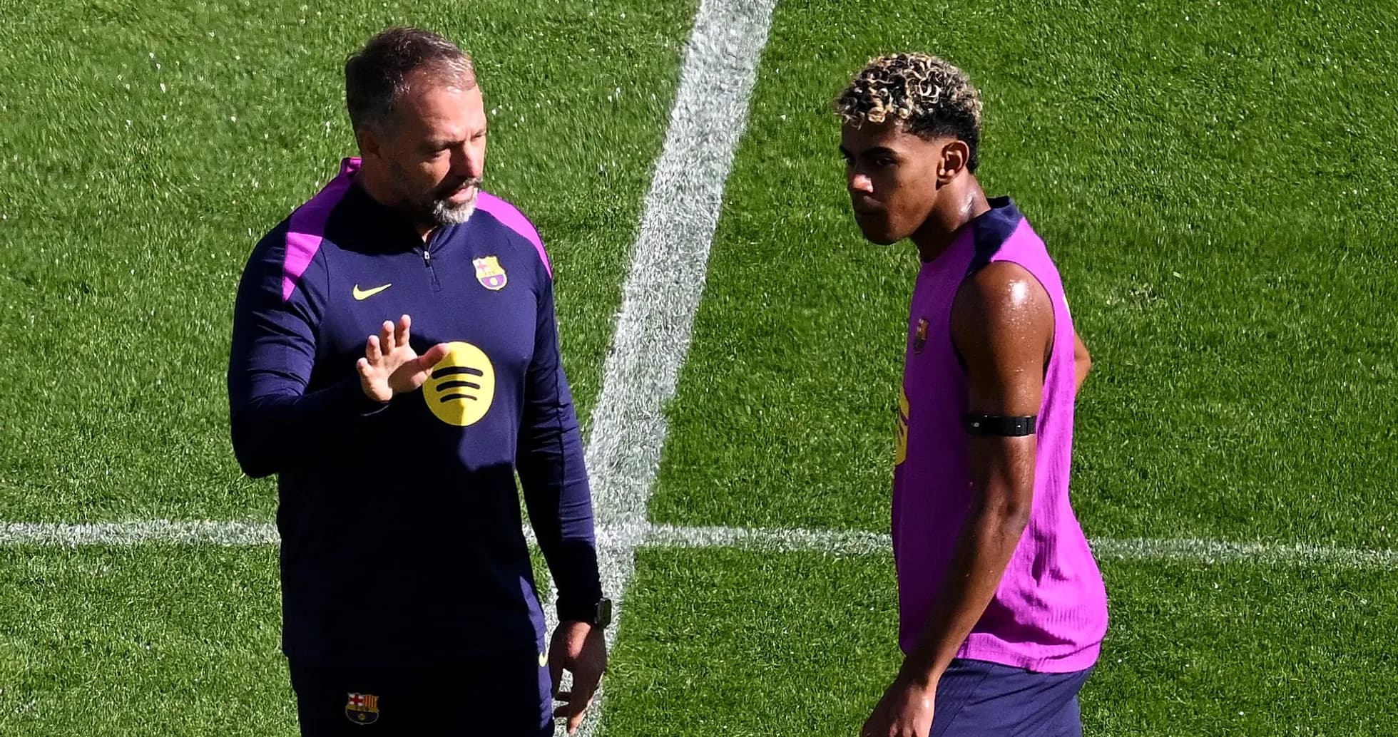 Coach instructing player during Barcelona training session Coach instructing player during Barcelona training session