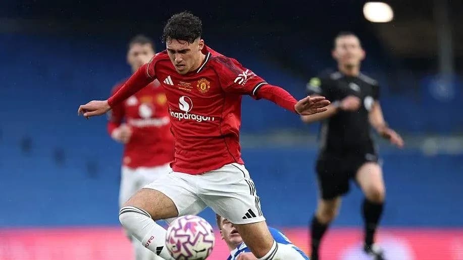 Player in red jersey falls while contesting ball Player in red jersey falls while contesting ball